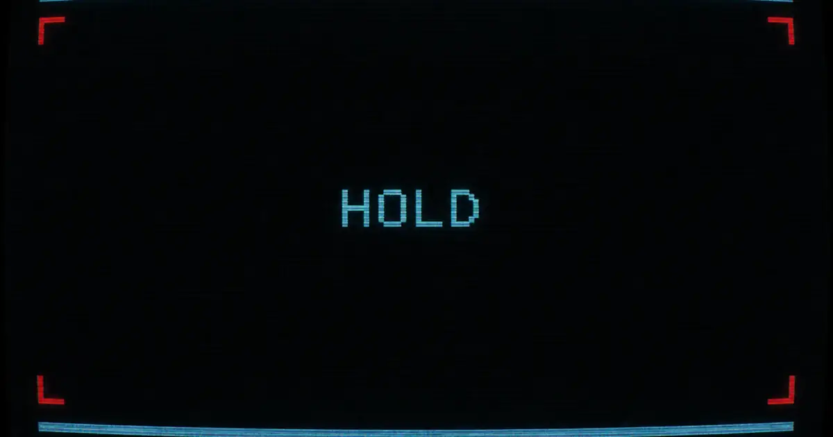 A frozen frame with cyan hold bars and red corners